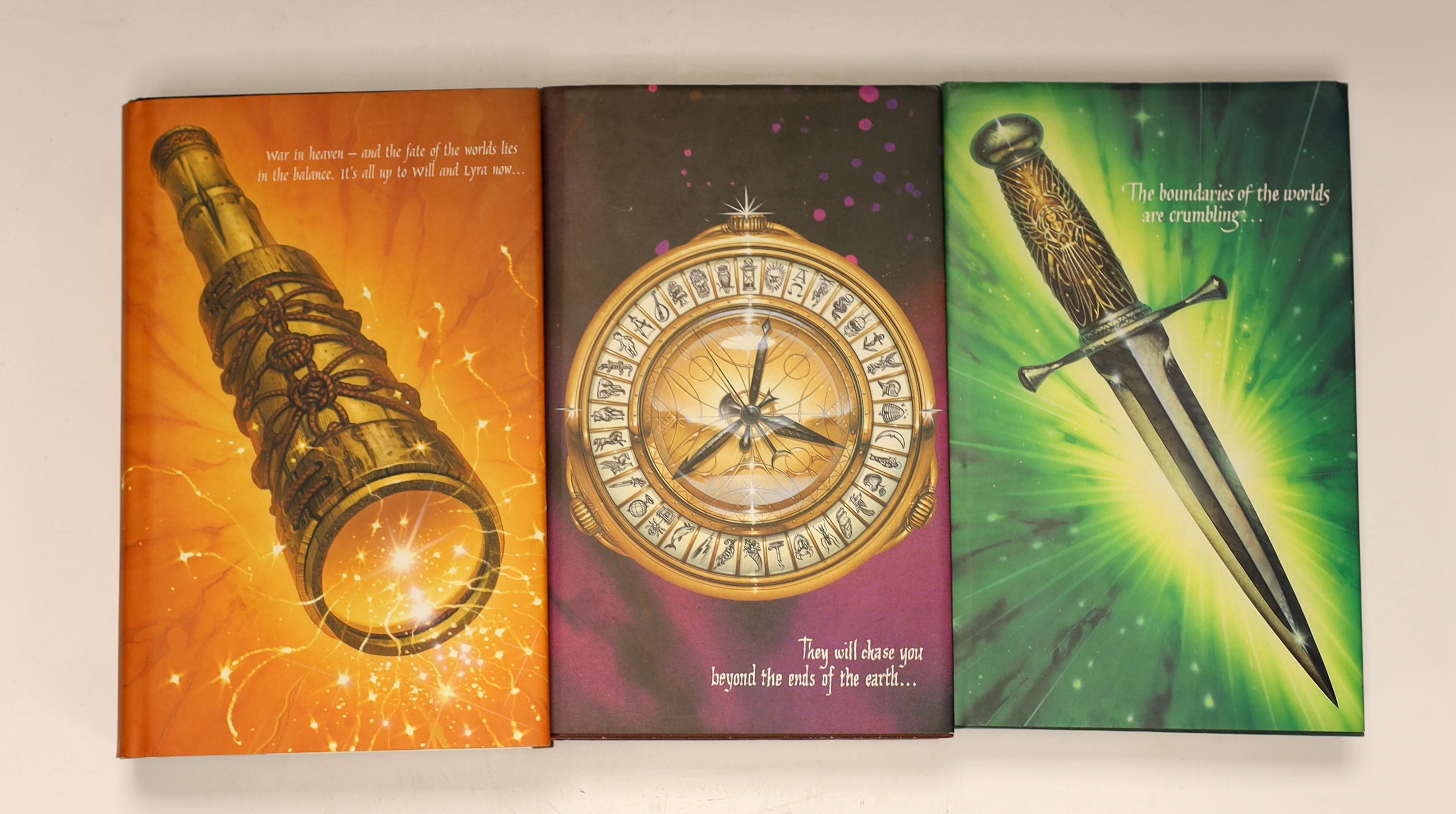 Pullman, Philip - His Dark Materials, 3 vols., First Editions - Northern Lights; The Subtle Knife; the Amber Spyglass. (first vol. inscribed by author on title; all vols. with half title, 3rd vol. with acknowledgment lea